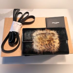 New Saint Laurent patent leather mini crossbody with fur details